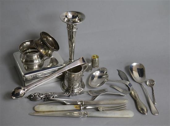 Assorted silver and other items including a silver cigarette box, silver spoons and napkin rings.